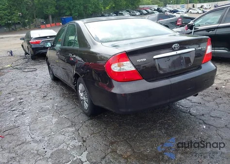 2002 Toyota Camry Le from USA, damaged, VIN JTDBE32K620108572